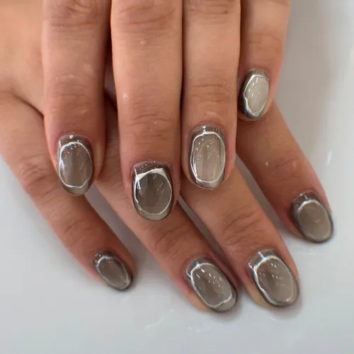 Chrome and cat eye nails by The Nail Bar, Farnworth, Bolton